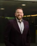 Headshot of Adam Collis
